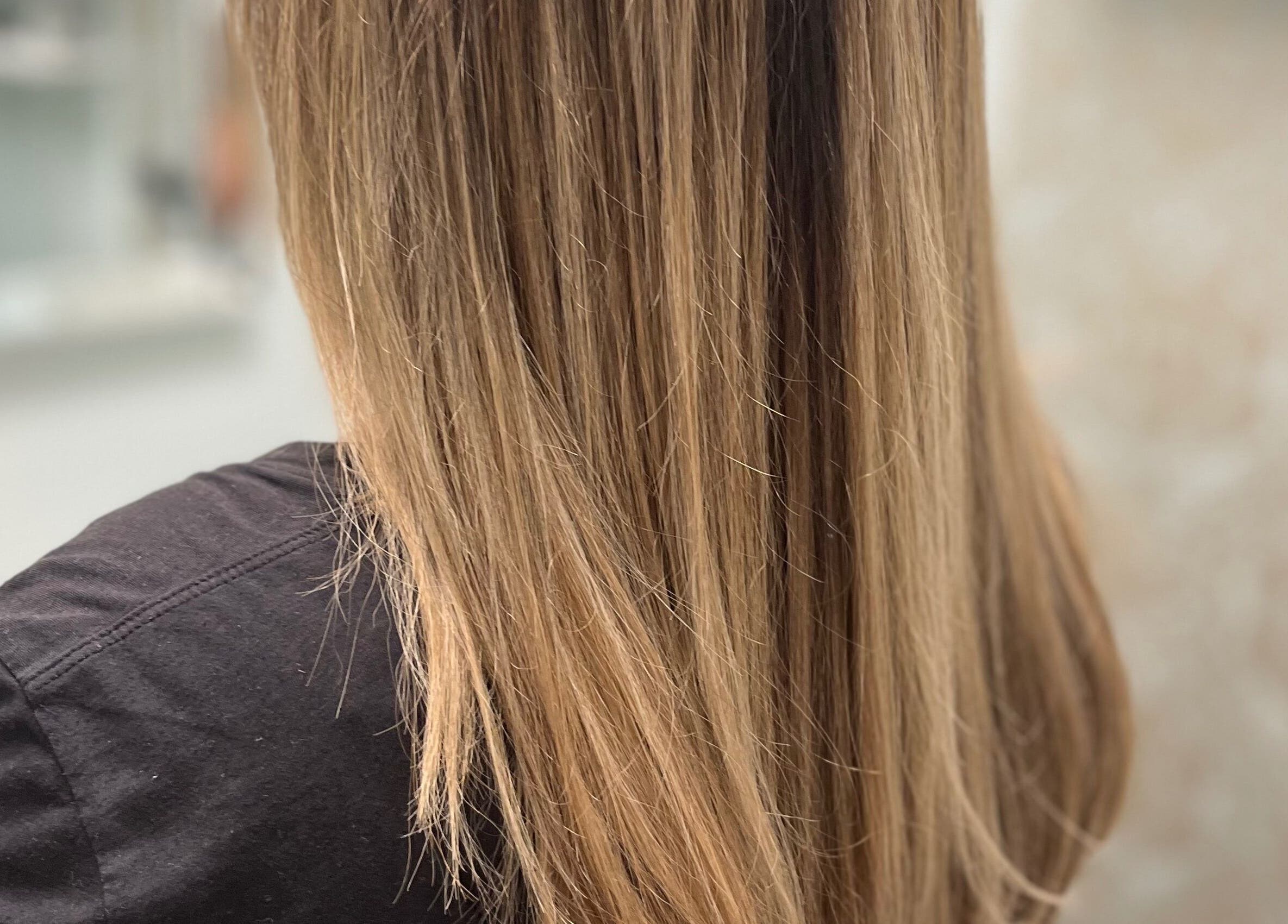 Smooth straight hair styled at Beauty By Nicole in Vaughan, Ontario, CA, showcasing professional hair care.