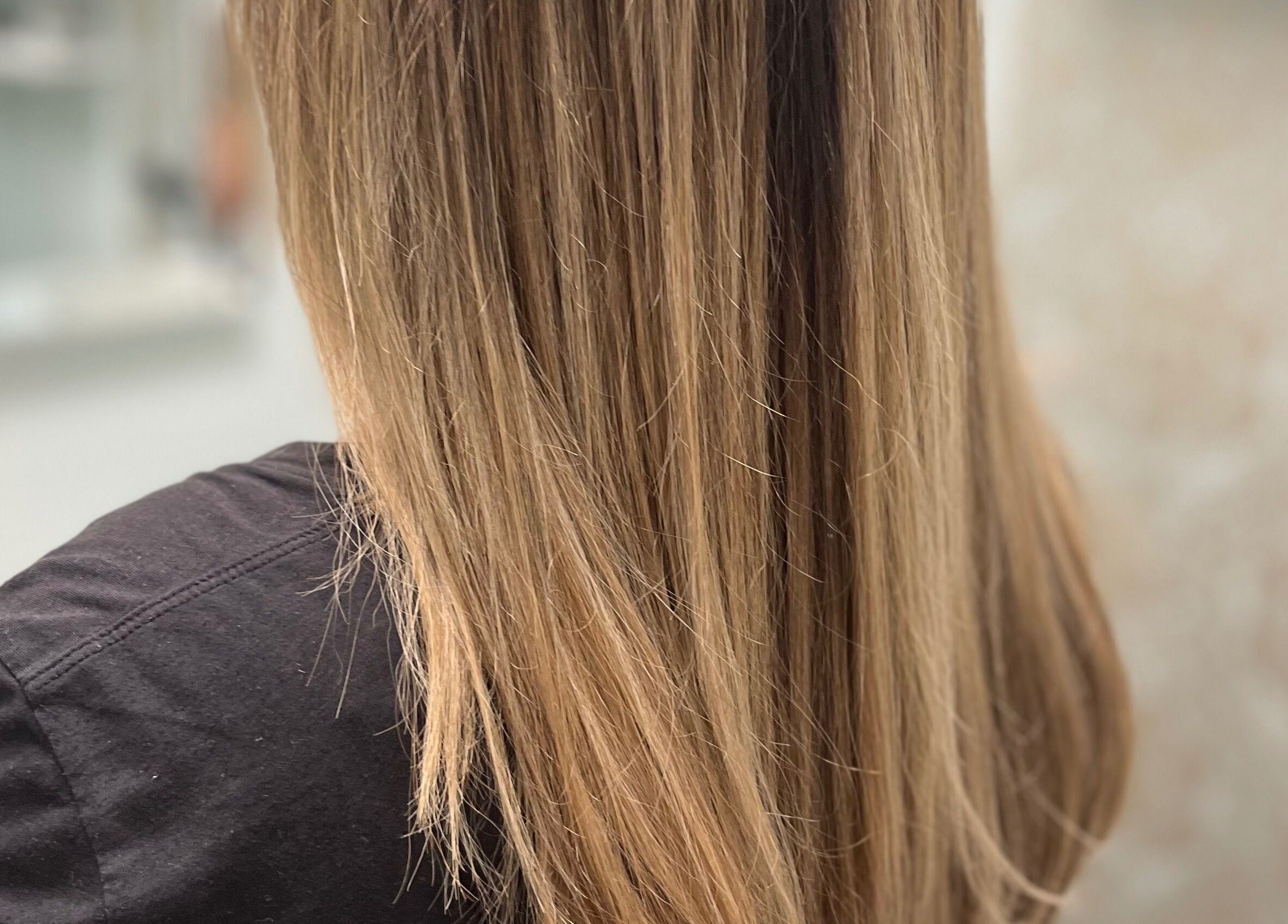 Smooth straight hair styled at Beauty By Nicole in Vaughan, Ontario, CA, showcasing professional hair care.