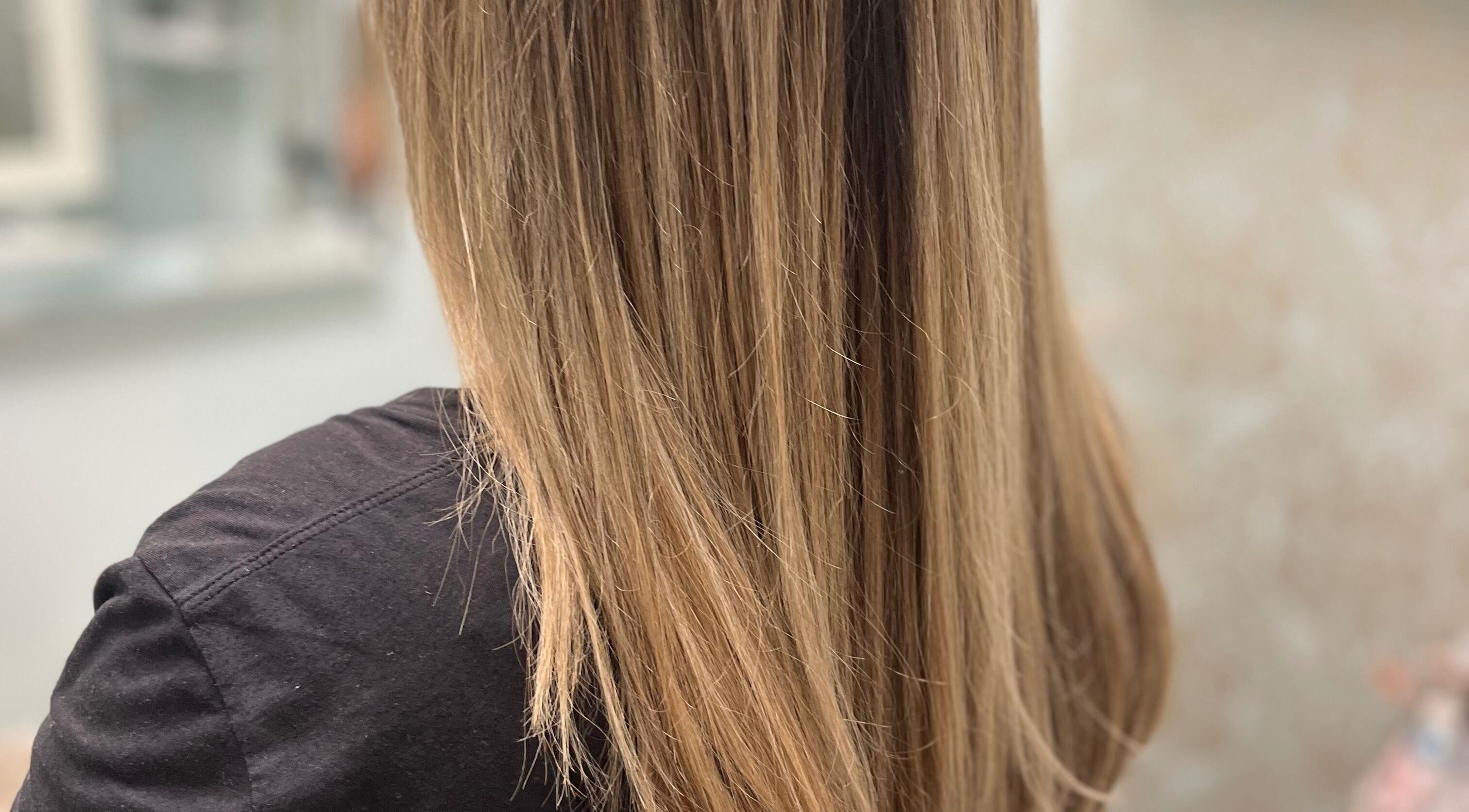 Smooth straight hair styled at Beauty By Nicole in Vaughan, Ontario, CA, showcasing professional hair care.