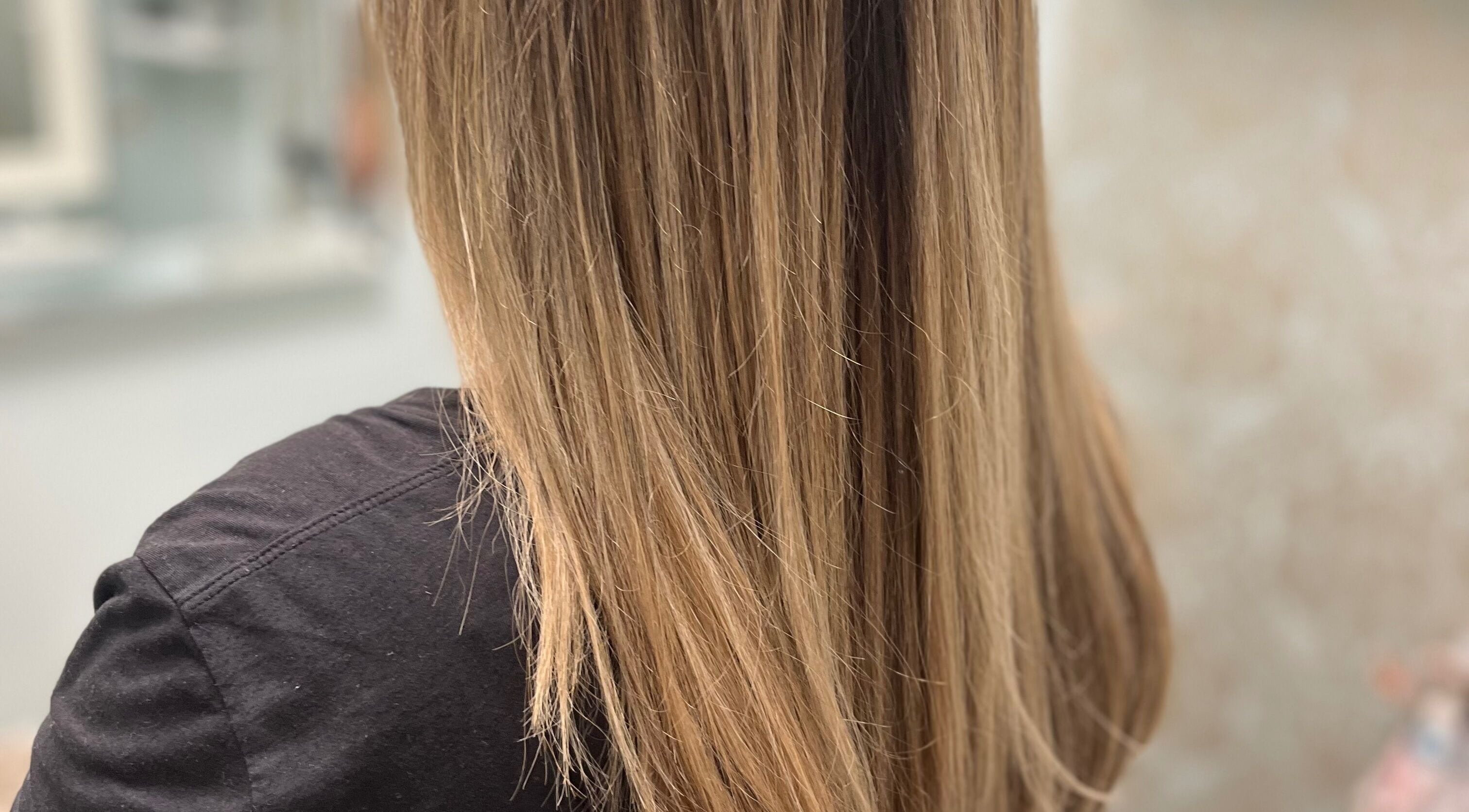 Smooth straight hair styled at Beauty By Nicole in Vaughan, Ontario, CA, showcasing professional hair care.