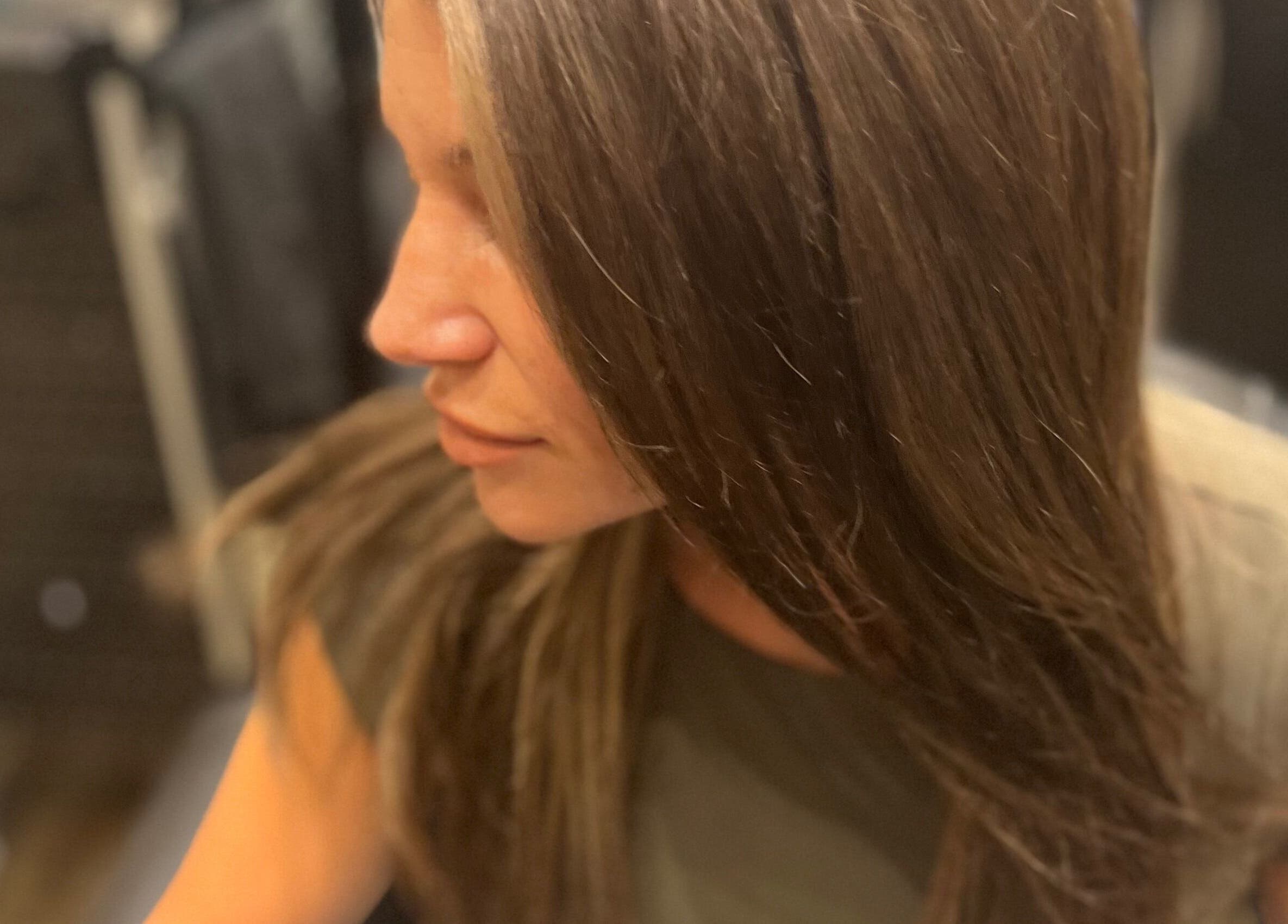 Woman enjoying haircare at Beauty By Nicole in Vaughan, Ontario, CA.