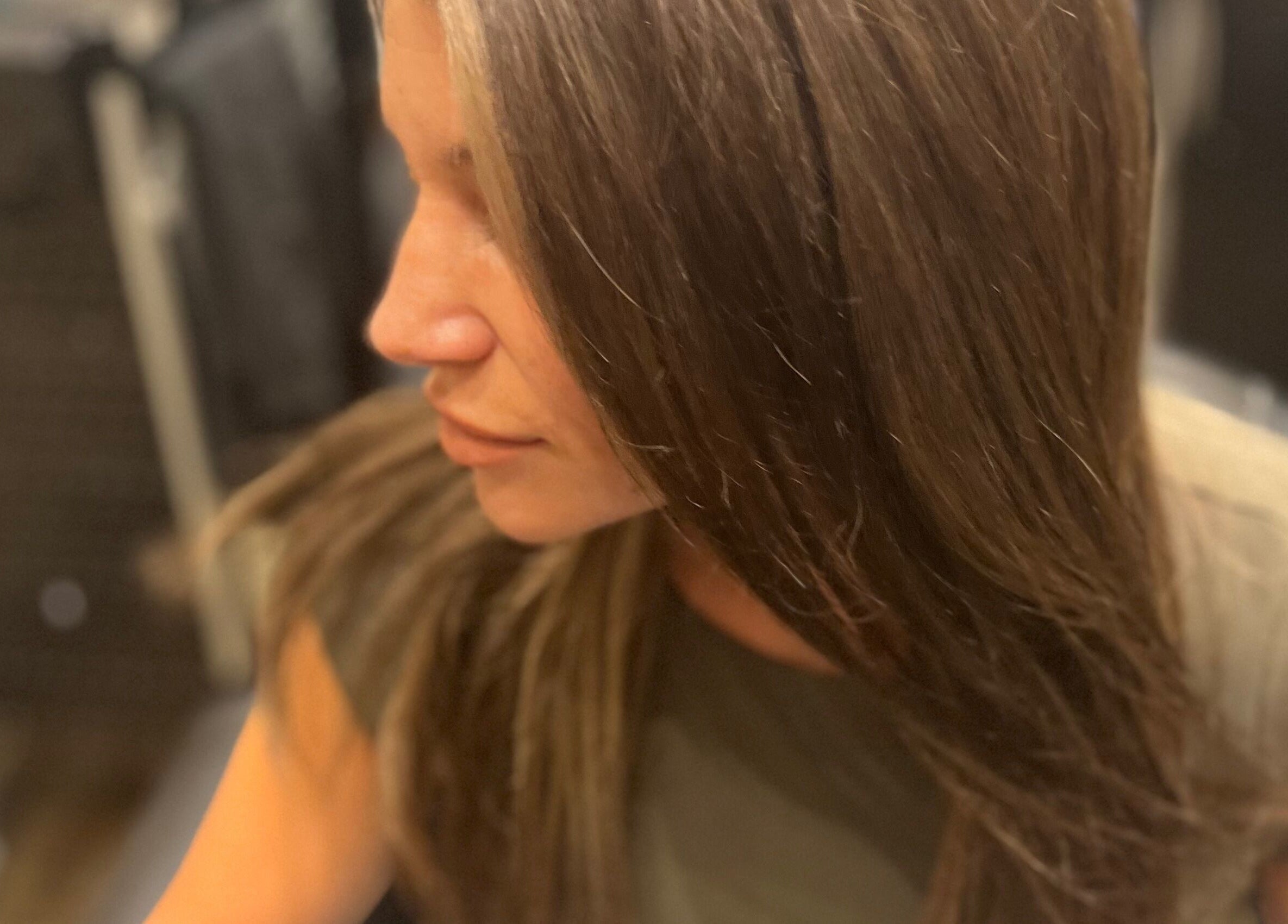 Woman enjoying haircare at Beauty By Nicole in Vaughan, Ontario, CA.