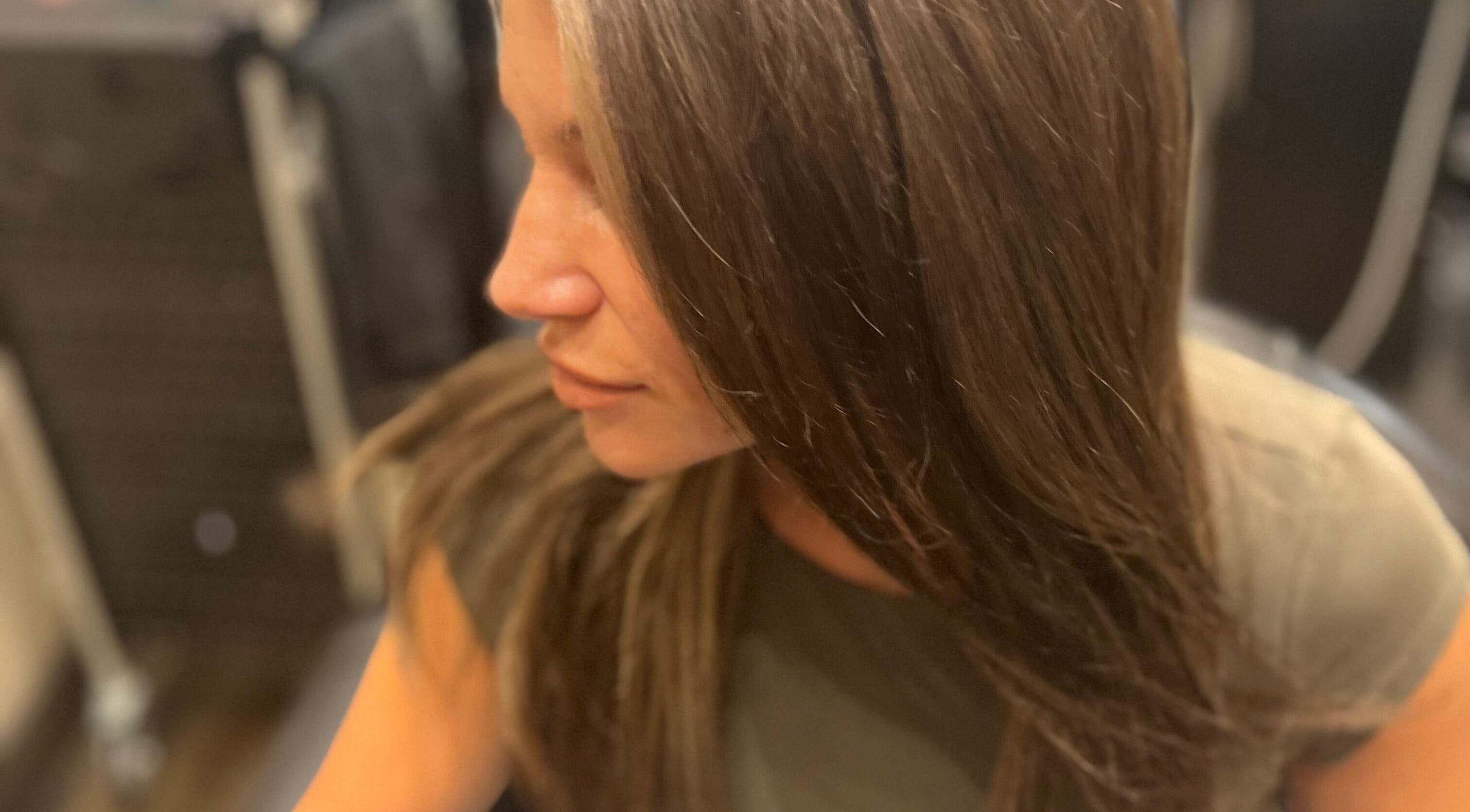 Woman enjoying haircare at Beauty By Nicole in Vaughan, Ontario, CA.