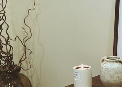 Elegant decor with candle and vase at Emma W Beauty at Muse Studio, Bristol, England, GB.