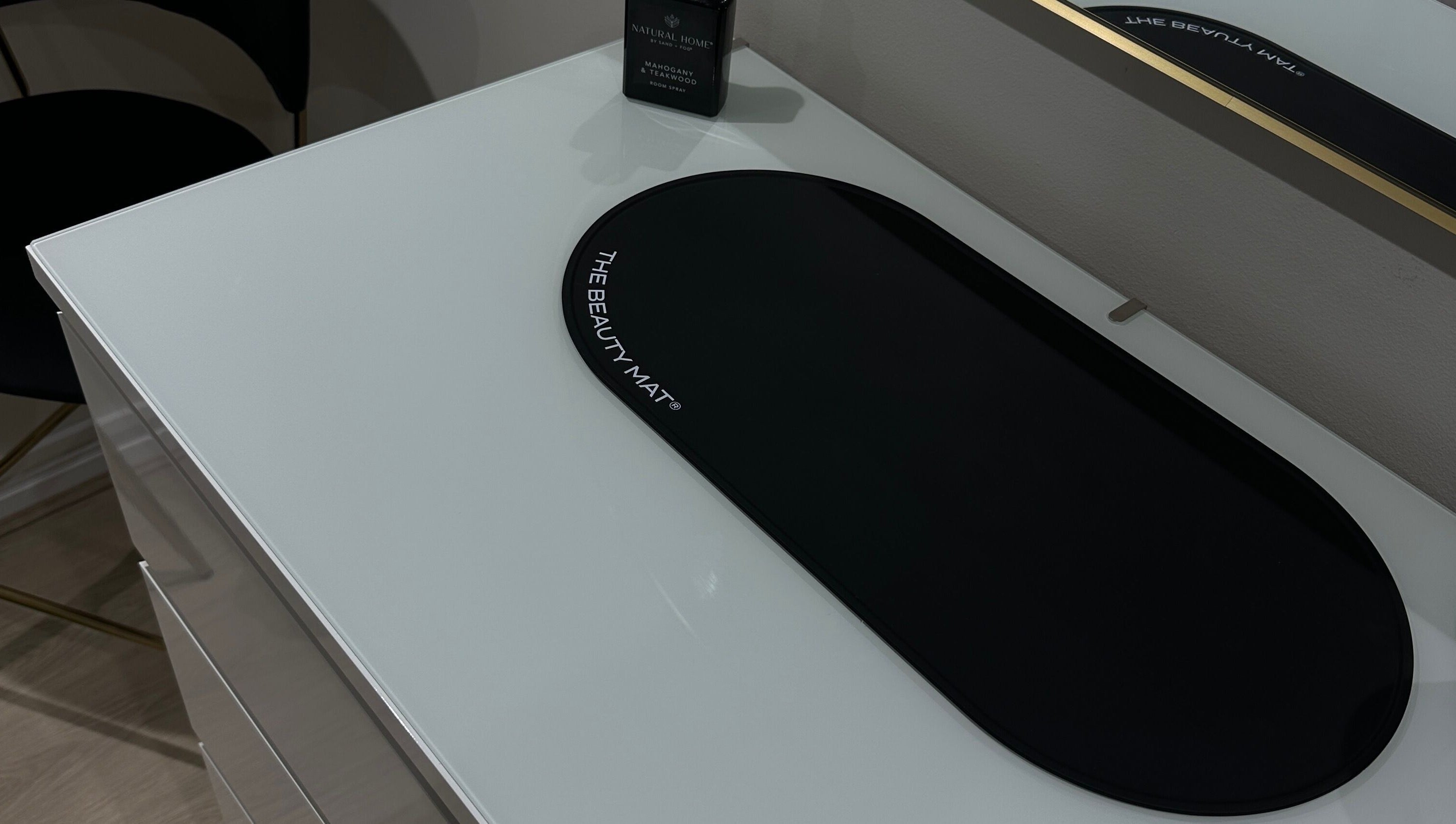 Stylish beauty station at Emma W Beauty, Bristol, England, GB, featuring a sleek mat and modern decor.