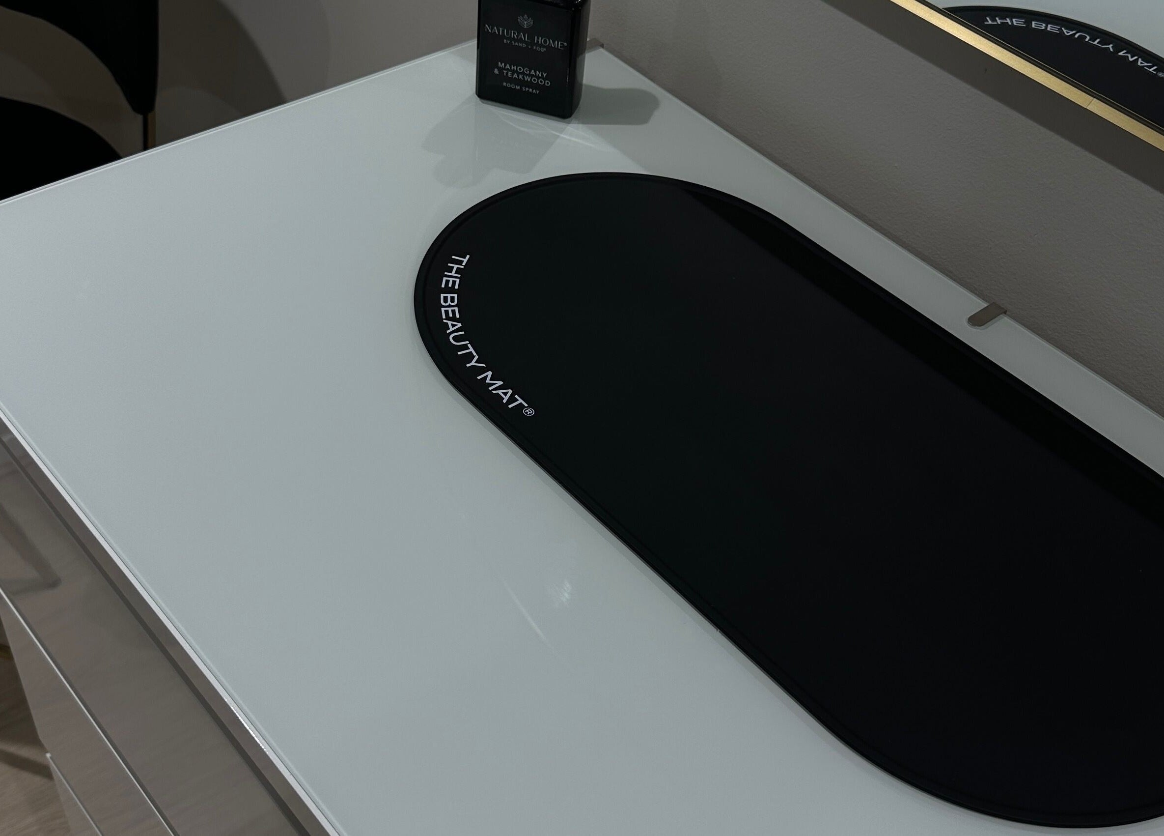 Stylish beauty station at Emma W Beauty, Bristol, England, GB, featuring a sleek mat and modern decor.