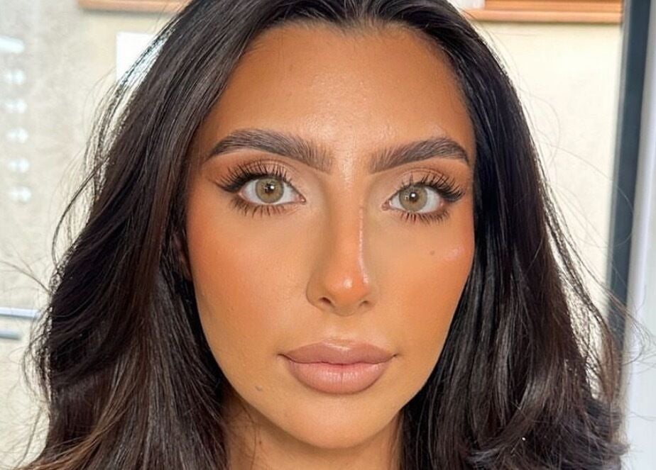 Close-up of a woman with flawless makeup at Emma W Beauty in Bristol, England, GB.