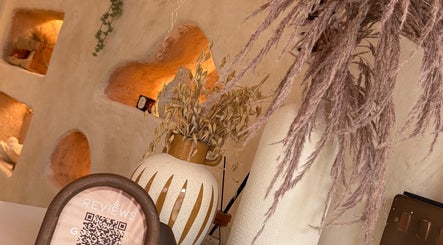 Elegant decor at Foxie Skin Clinic @ Mantra Collaborative, Bolton, England, GB with a vase and dried flowers.