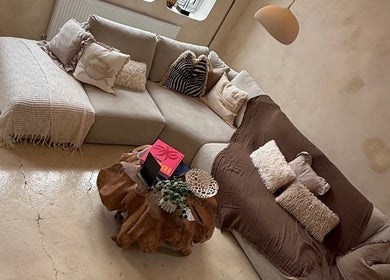 Inviting lounge area in Foxie Skin Clinic @ Mantra Collaborative, Bolton, England, GB with cozy couches and decor.
