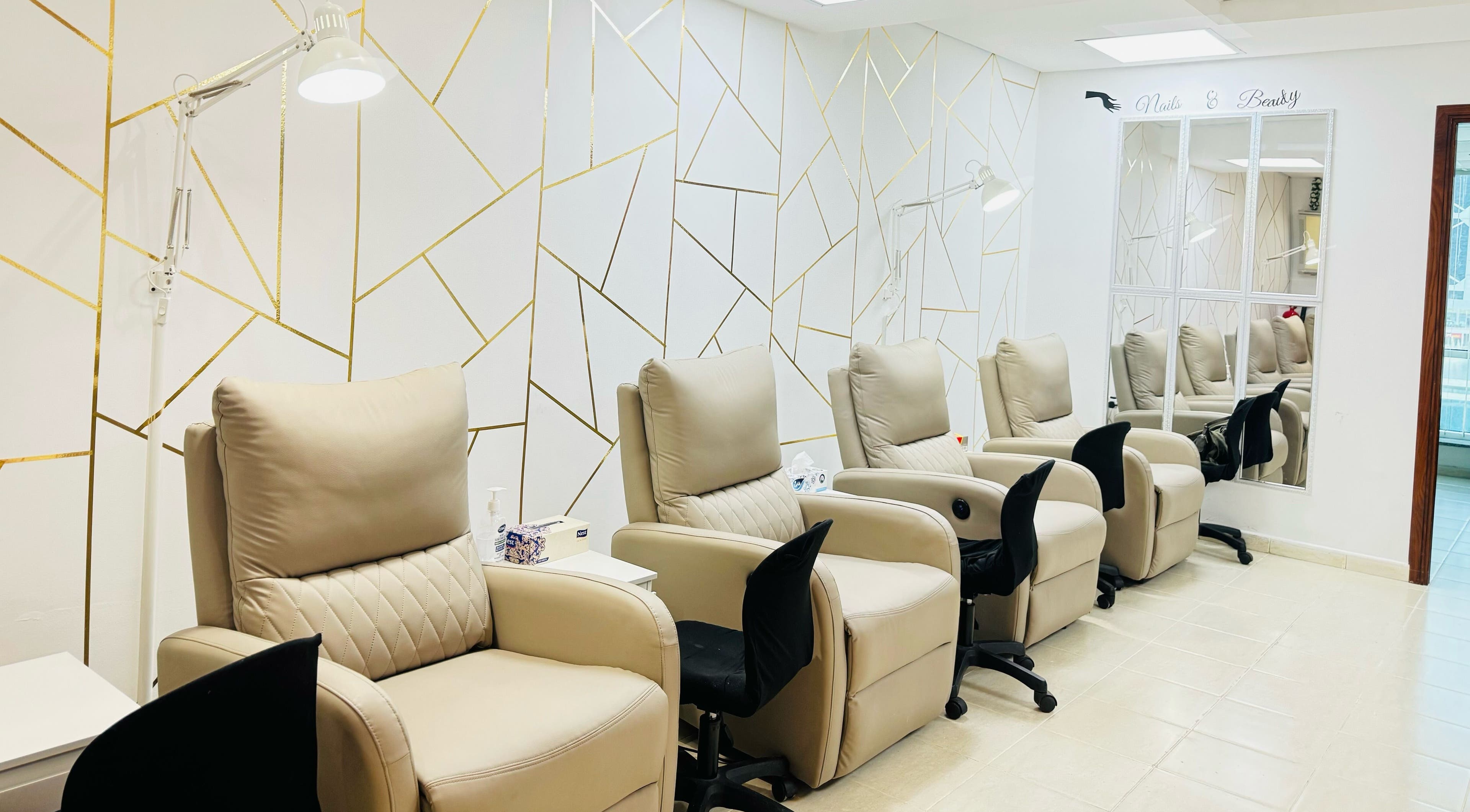 Comfortable manicure chairs at F NAILS BEAUTY SPA, Dubai, Dubai, AE, offering a luxurious relaxation experience.