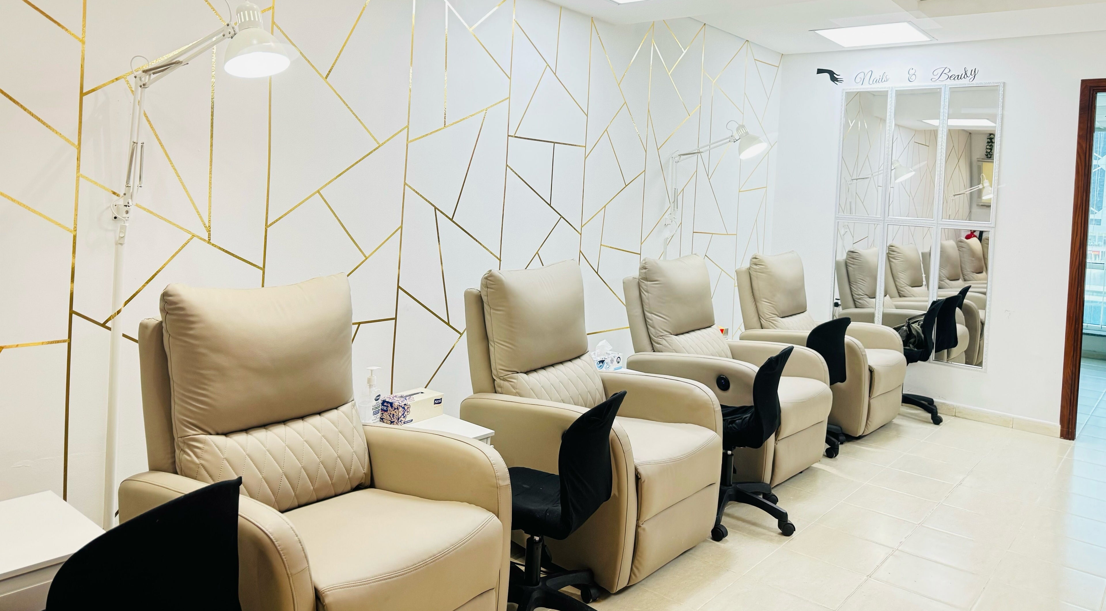 Comfortable manicure chairs at F NAILS BEAUTY SPA, Dubai, Dubai, AE, offering a luxurious relaxation experience.