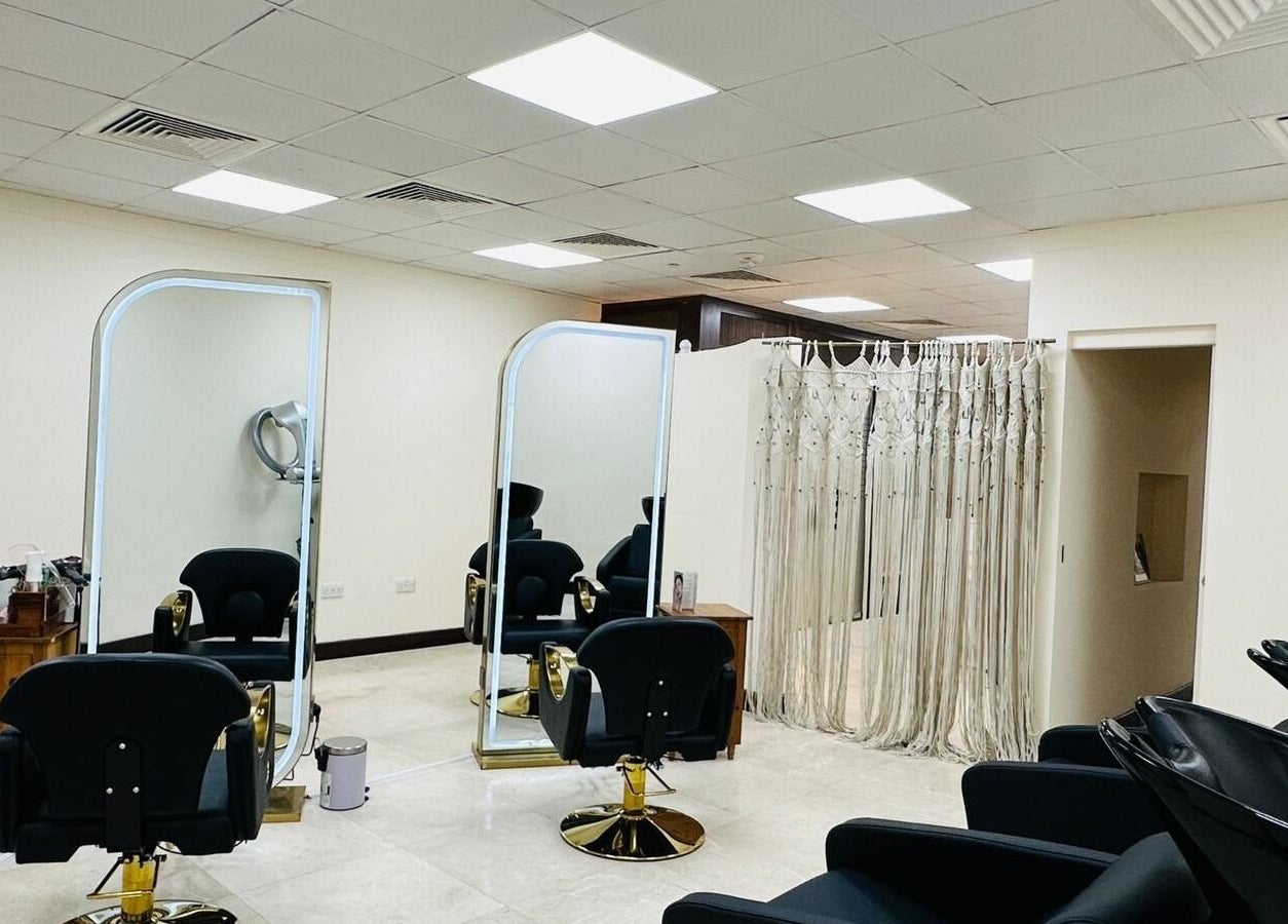 Korea Beauty Salon's chic interior, featuring sleek hair stations in Muscat, Muscat Governorate, OM.