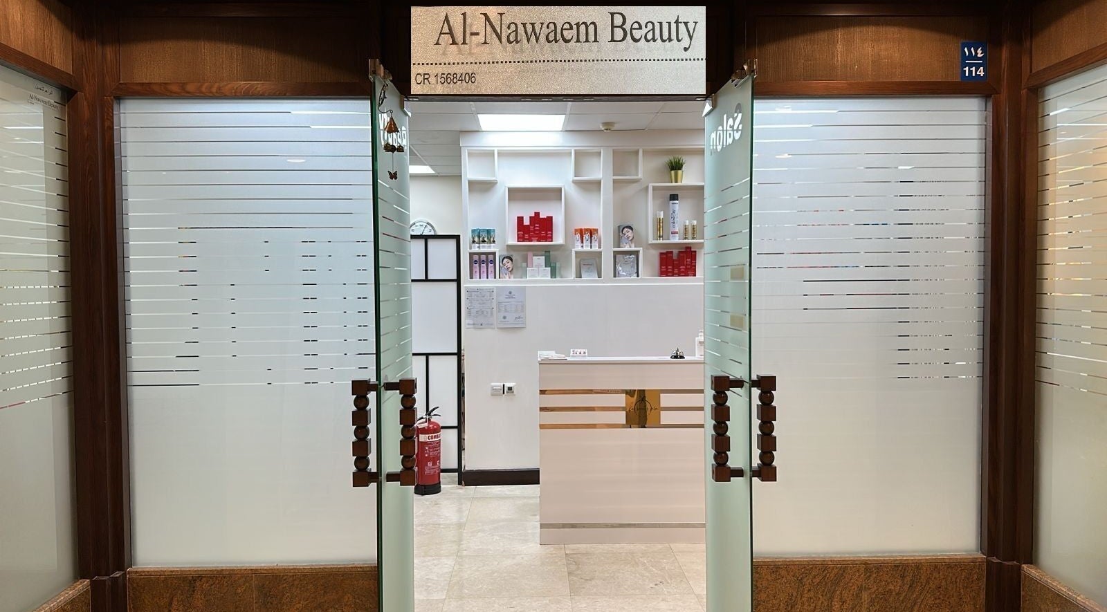 Entrance of Korea Beauty Salon in Muscat Governorate, OM with sleek glass doors and modern decor.