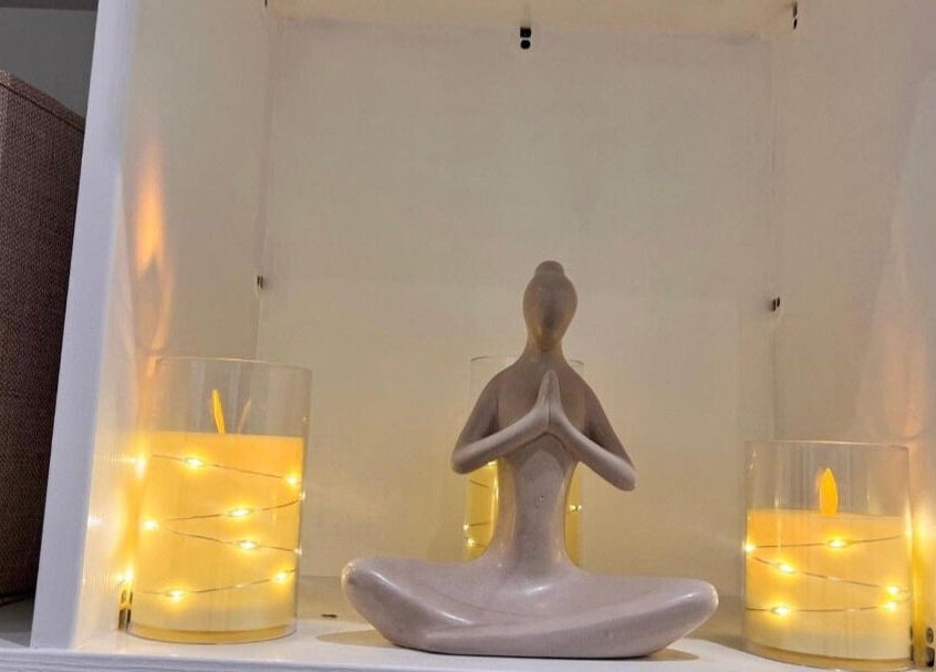 Sculpture with candles at B Beautiful Birmingham at Endres, creating a peaceful atmosphere in Birmingham, England, GB.
