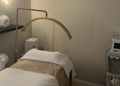 Relaxing spa room at Skinalicious London in Bexley, England equipped with modern wellness devices.