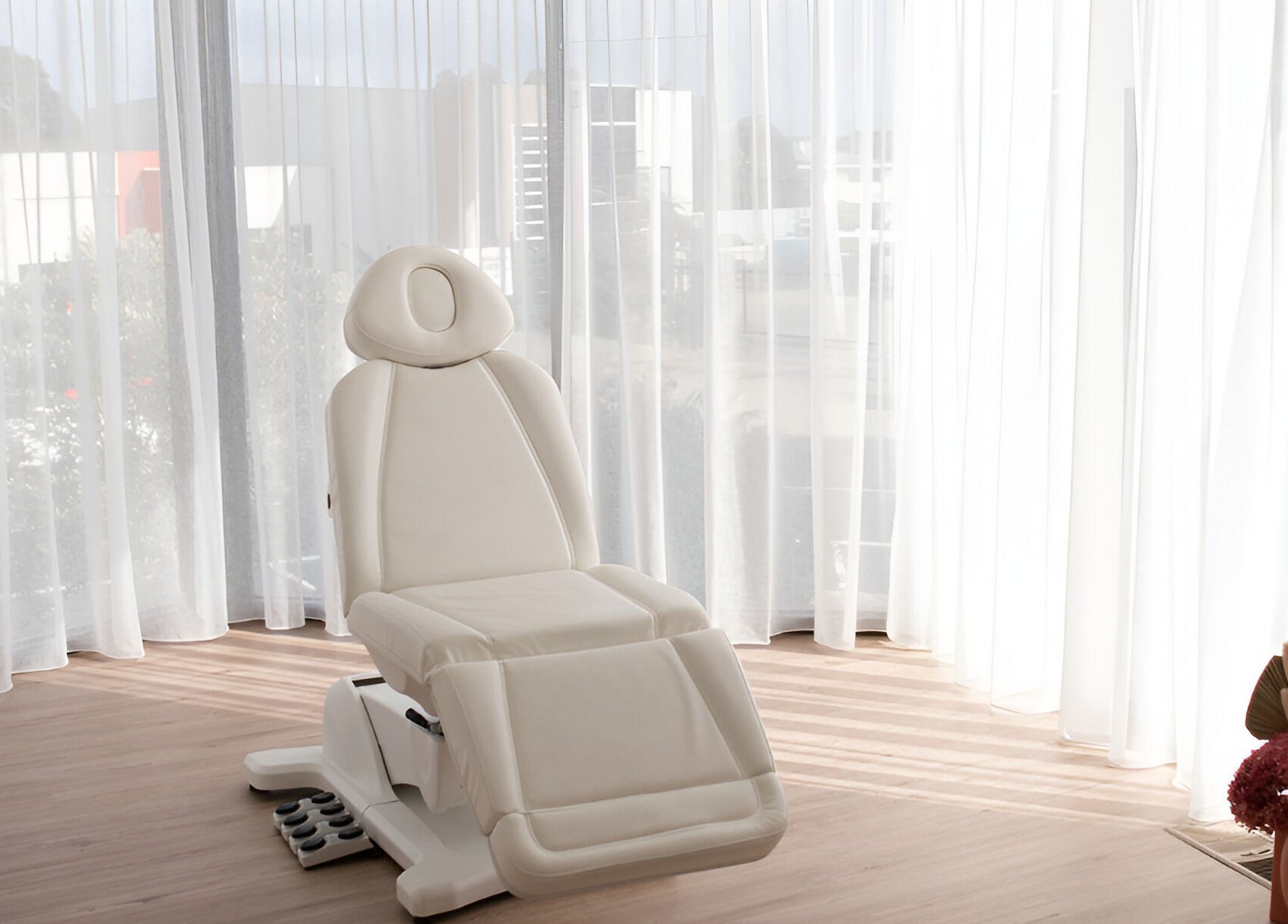 Luxurious treatment chair at Your Aesthetic, Berwick, VIC, AU with natural light and elegant decor.
