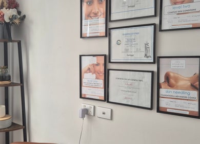 Certificates and decor at The Slimming Lounge, Parramatta, NSW, AU showcasing achievements and ambiance.