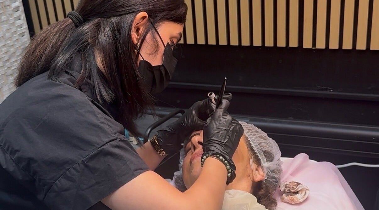 Artist applying makeup at Hornsby Studio, Hornsby, New South Wales, AU. Expert beauty service in action.