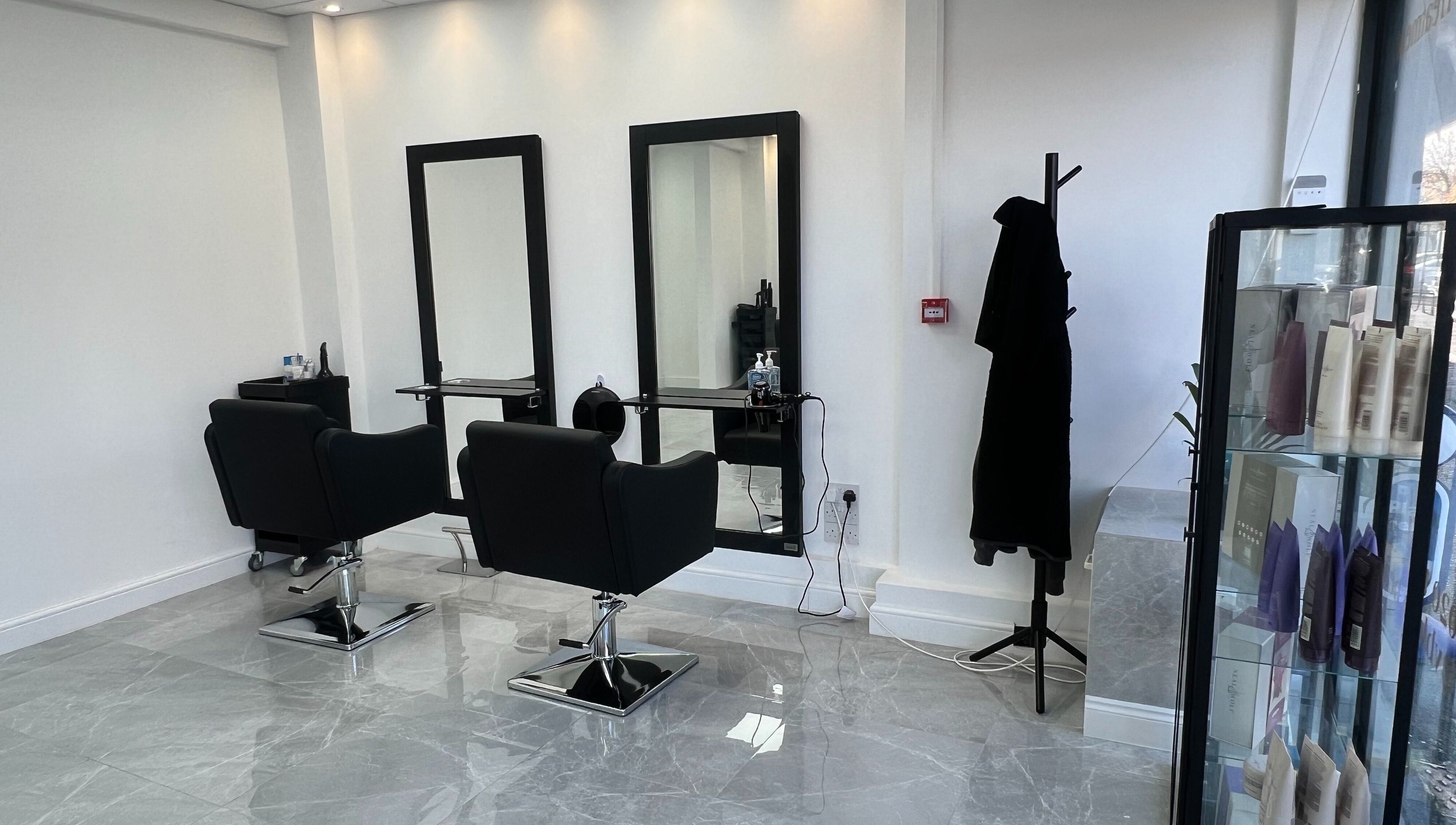 Modern salon interior at V Blush, with sleek chairs and mirrors in London, England, GB.