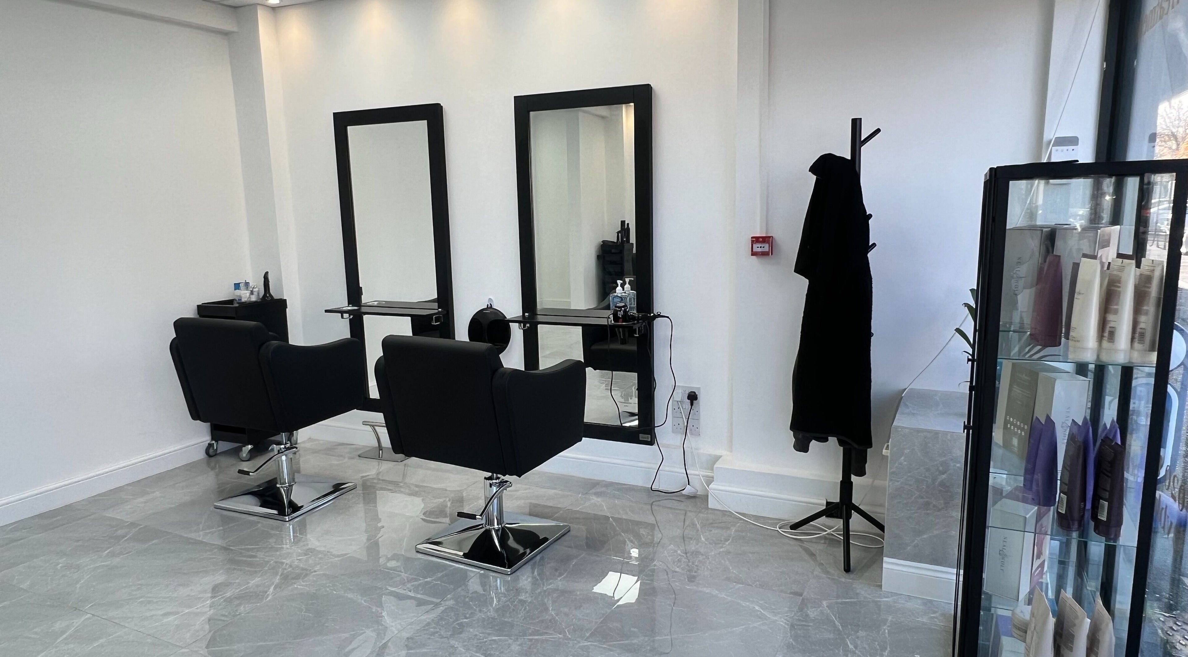 Modern salon interior at V Blush, with sleek chairs and mirrors in London, England, GB.