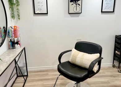 Elegant salon chair setup at Hairstyling by Taitum in Renfrew, Ontario, CA featuring modern decor.