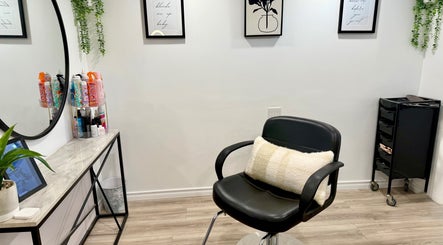 Elegant salon chair setup at Hairstyling by Taitum in Renfrew, Ontario, CA featuring modern decor.