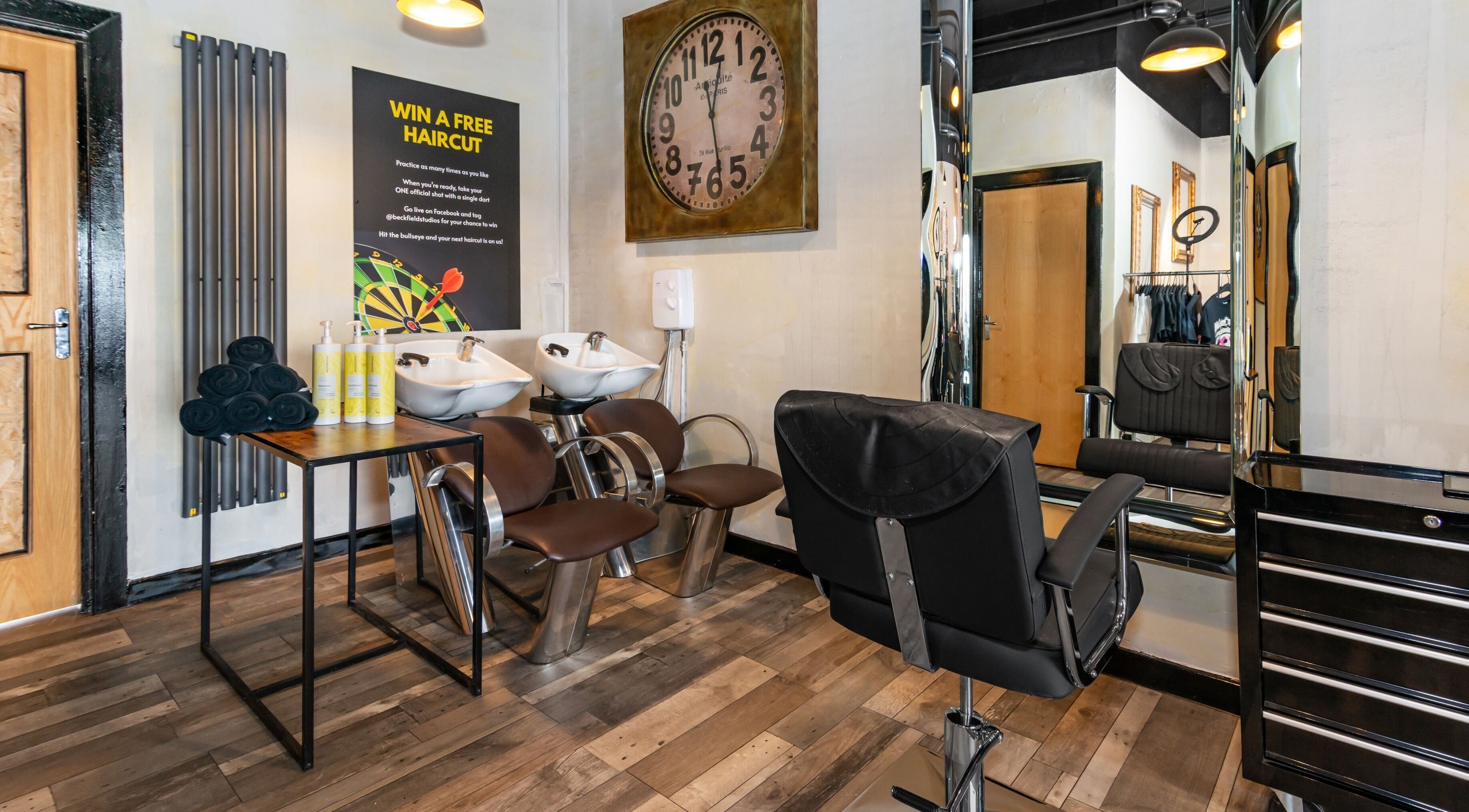 Modern salon chairs and washbasins at Beckfield Studios, Thornaby, England, GB.
