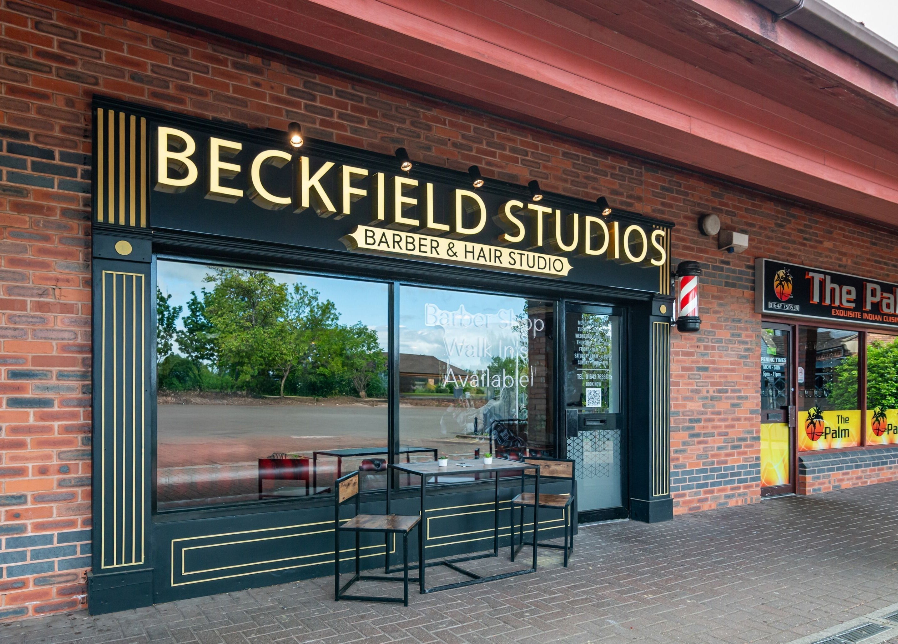 Exterior of Beckfield Studios in Thornaby, England, showcasing its stylish barber shop entrance.