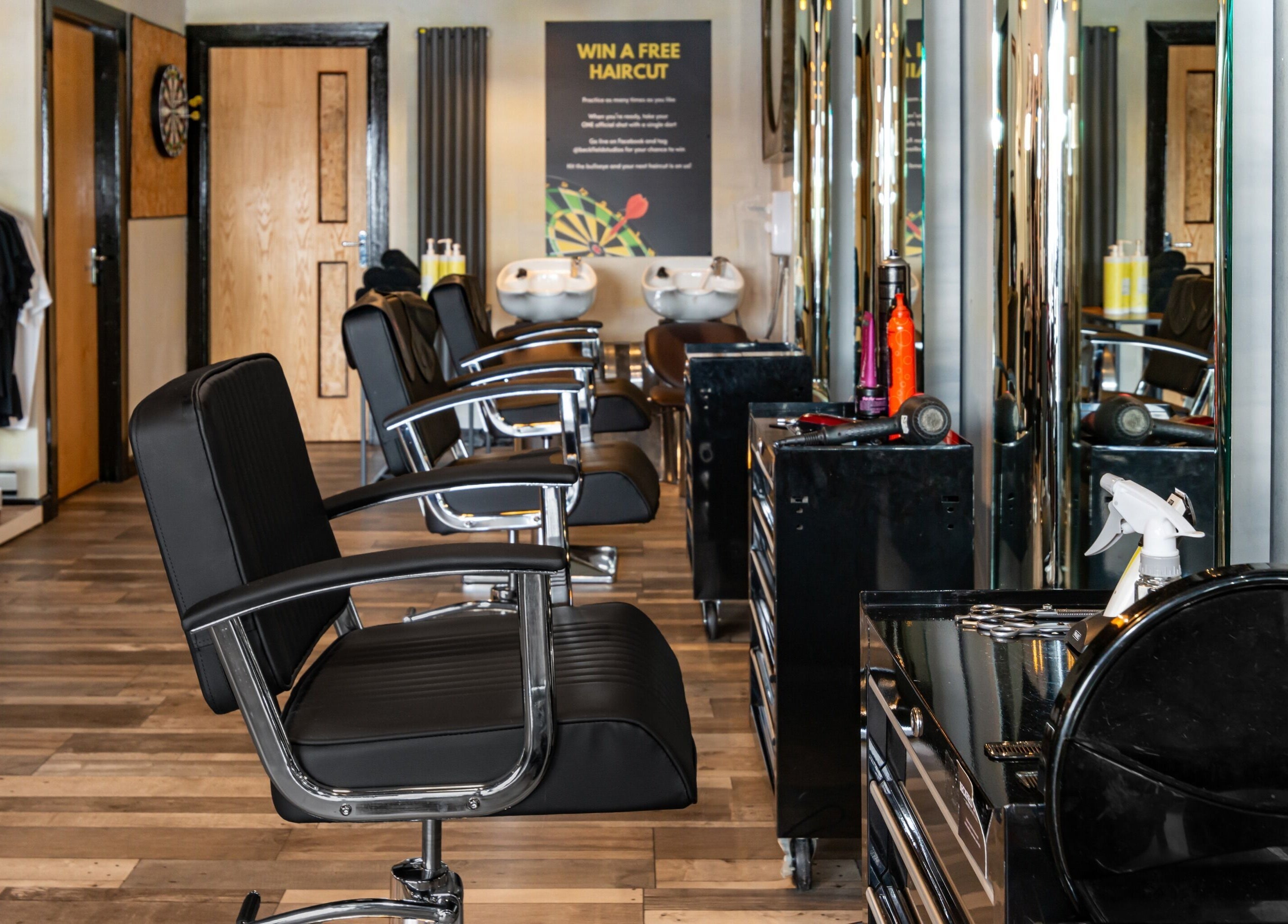 Modern salon chairs at Beckfield Studios, Thornaby, England, GB, showcasing a sleek and inviting interior.