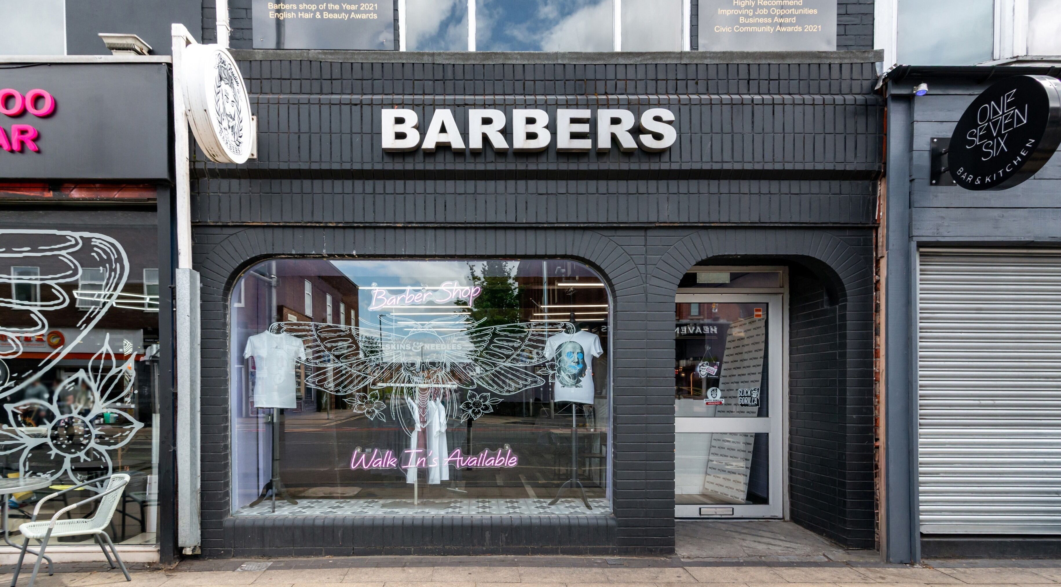 Skins & Needles Barbers storefront in Middlesbrough, England, GB, showcasing stylish exterior with signage.