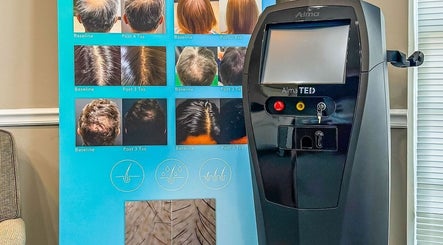 Advanced hair treatment display and machine at ELEVATE, Bellmore, New York, US spa.