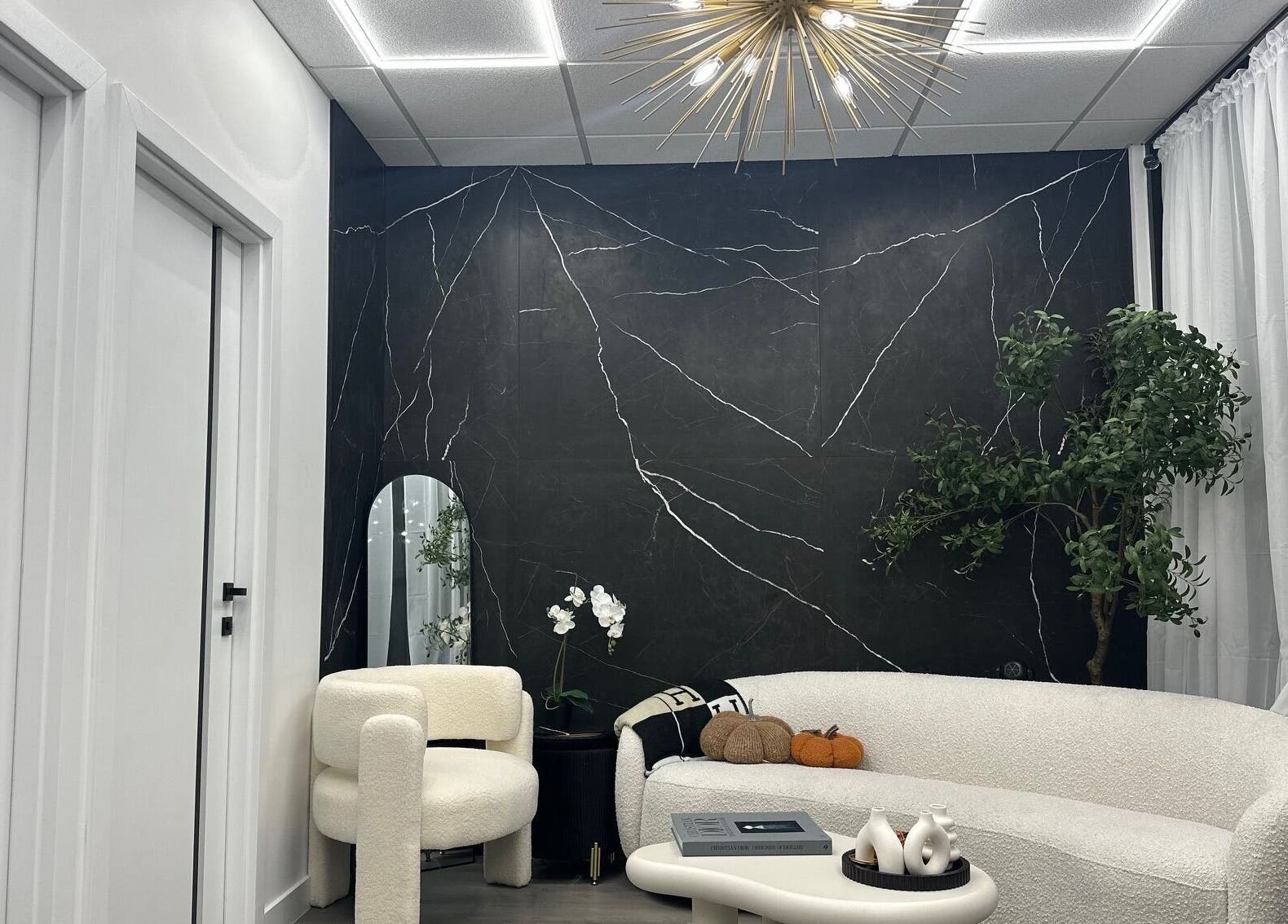 Elegant lounge area at ELEVATE, Bellmore, New York, US with stylish decor and luxurious seating.