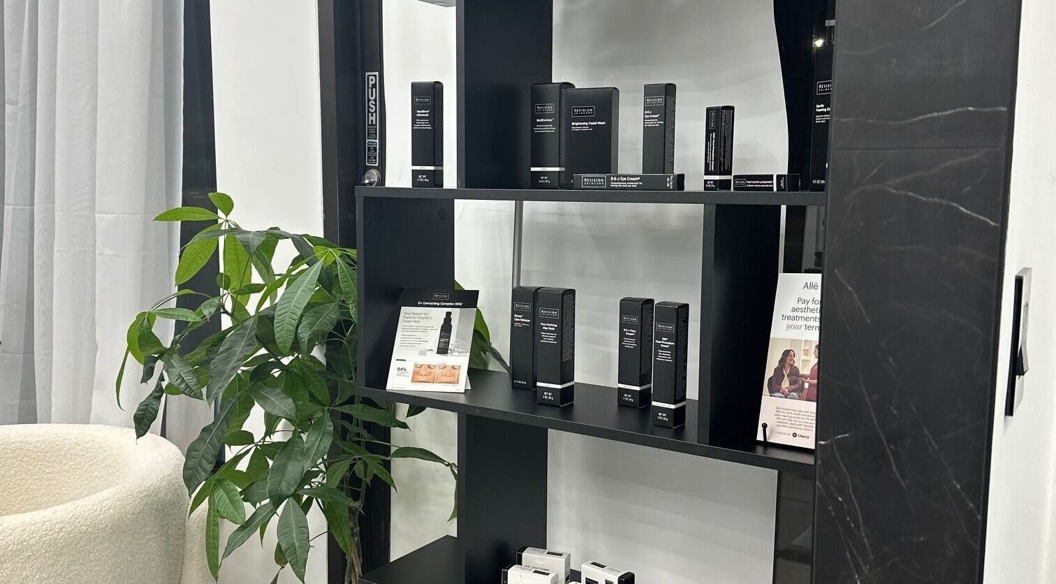 Elegant product display at ELEVATE, Bellmore, New York, US, showcasing luxury beauty items.