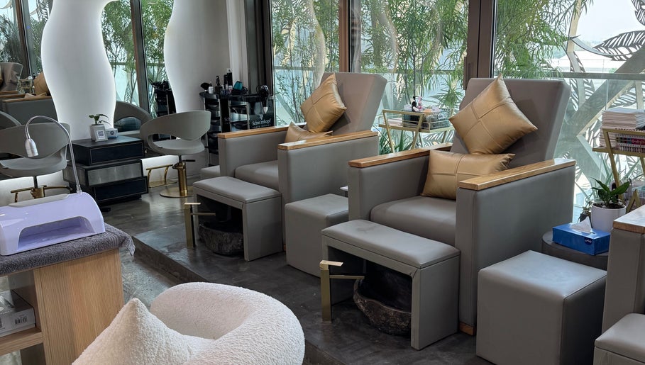 Elegant pedicure area at Aceituna Beauty Salon L.L.C, Dubai, Dubai, AE, featuring plush chairs and stylish decor.