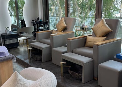 Elegant pedicure area at Aceituna Beauty Salon L.L.C, Dubai, Dubai, AE, featuring plush chairs and stylish decor.