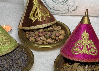 Decorative bowls with aromatic herbs and ornate covers at Aceituna Beauty Salon L.L.C, Dubai, Dubai, AE.