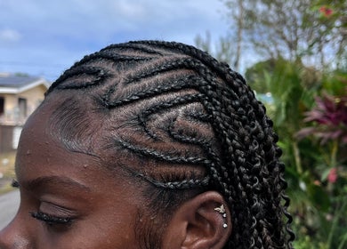Close-up of intricate braided hairstyle by BraidedbyZy in Saint James, Saint James, BB.