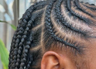 Intricate cornrow braids at BraidedbyZy in Saint James, Saint James, BB, showcasing expert craftsmanship.