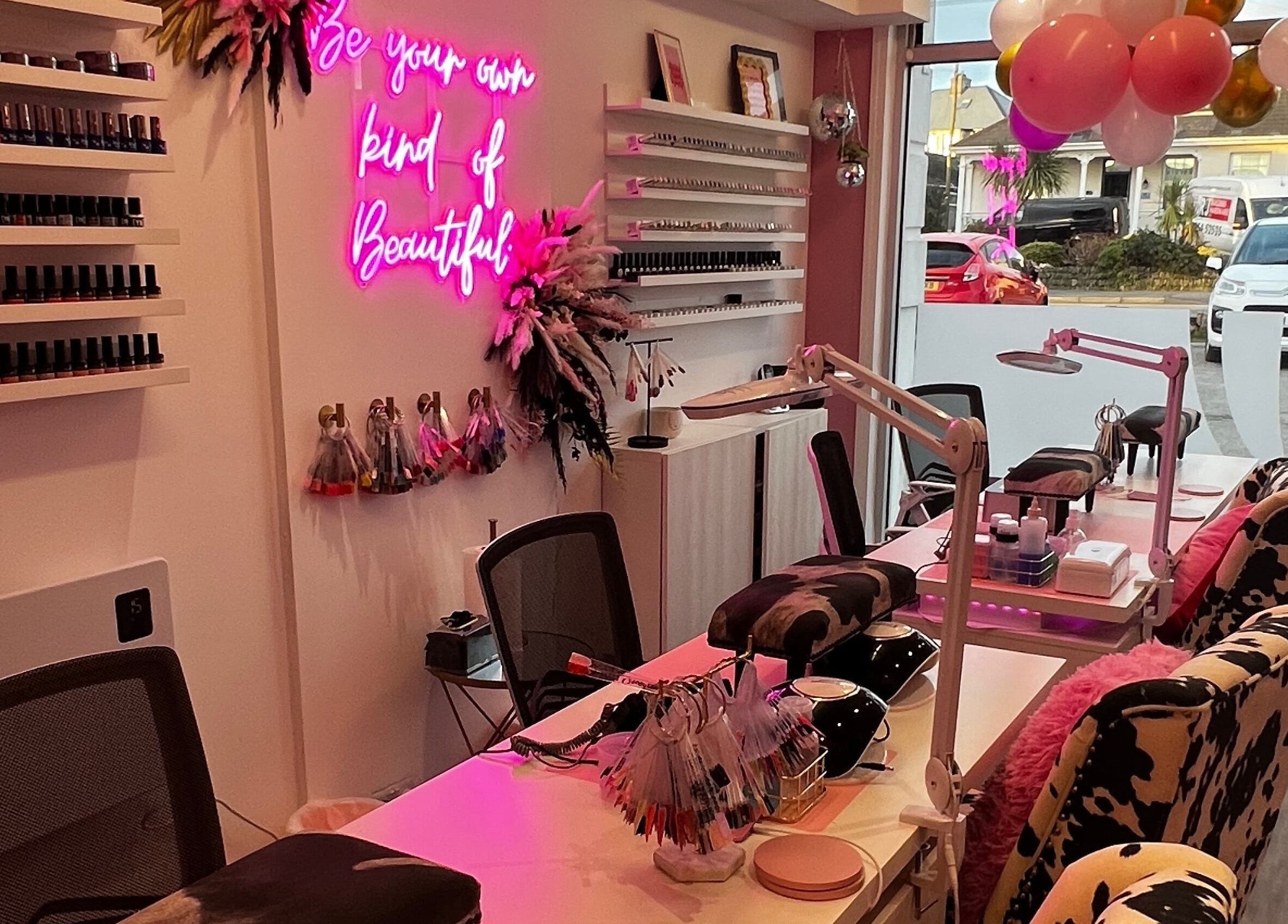 Stylish interior of The Nail Studio - Newquay, featuring nail stations and decor, located in Newquay, England, GB.