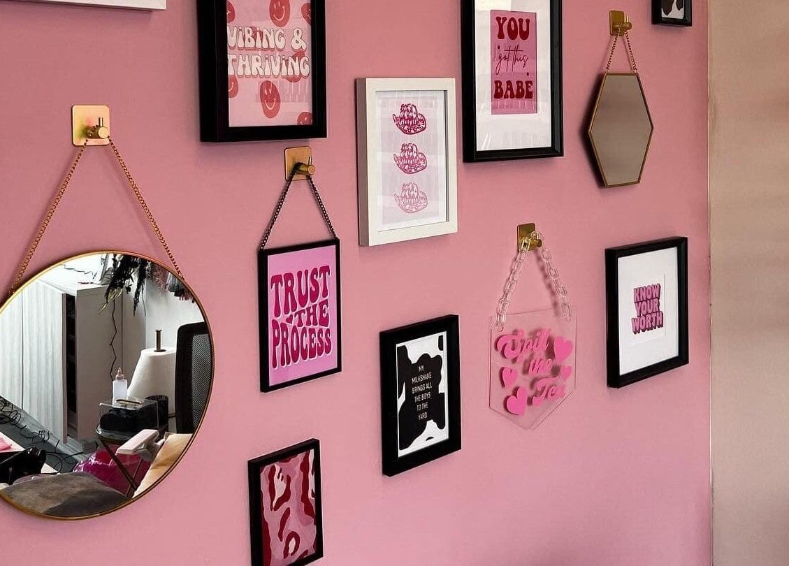Stylish wall decor at The Nail Studio - Newquay, Newquay, England, GB, showcasing modern design in pink hues.