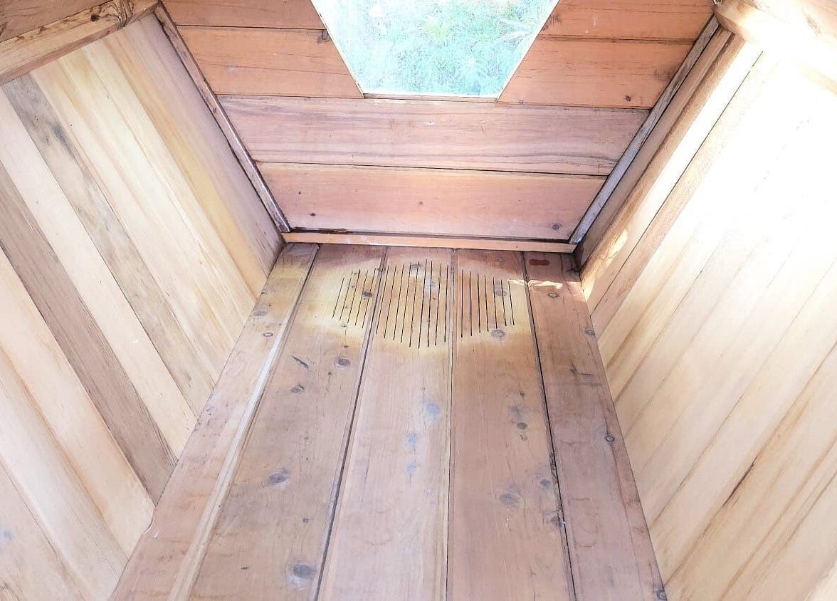 Rustic wooden interior at Bee Alive, Mullumbimby, New South Wales, AU offering a cozy retreat ambiance.