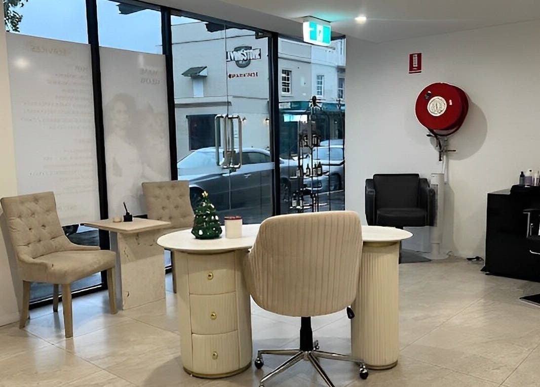 Elegant waiting area at Mane Glow Curls and Extensions, Petersham, New South Wales, AU with stylish seating.