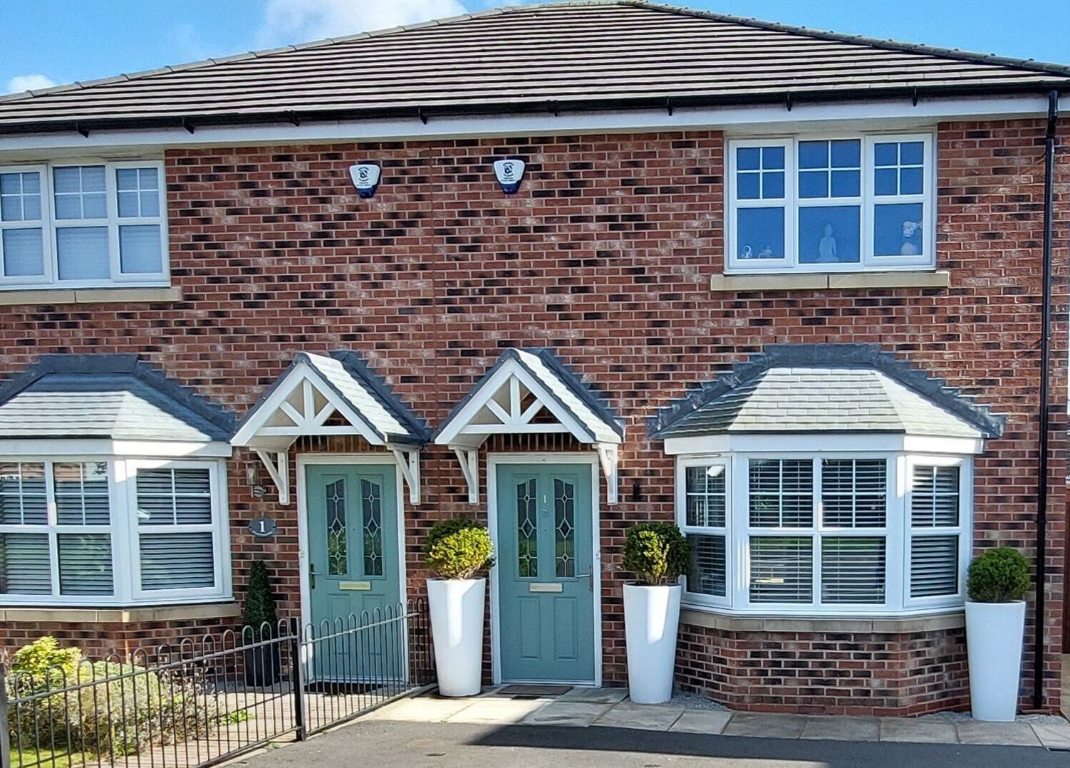 Exterior view of Forest Massage Therapies venue, located in Saint Helens, England, GB, with brick facade and bay windows.