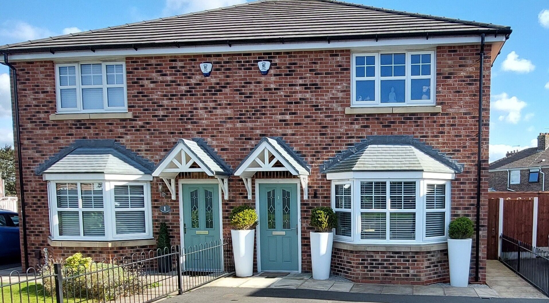 Exterior view of Forest Massage Therapies venue, located in Saint Helens, England, GB, with brick facade and bay windows.
