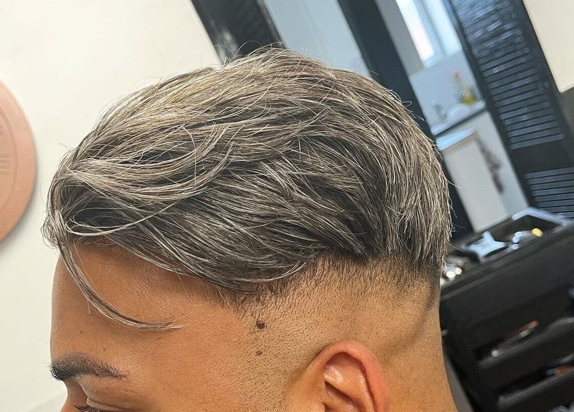 Modern hairstyle at Salon 63, Albrighton, England, GB, showcasing elegance and style.