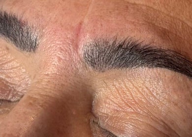 Close-up of expertly styled eyebrows at Arch and Lash, Upper Heyford, England, GB.