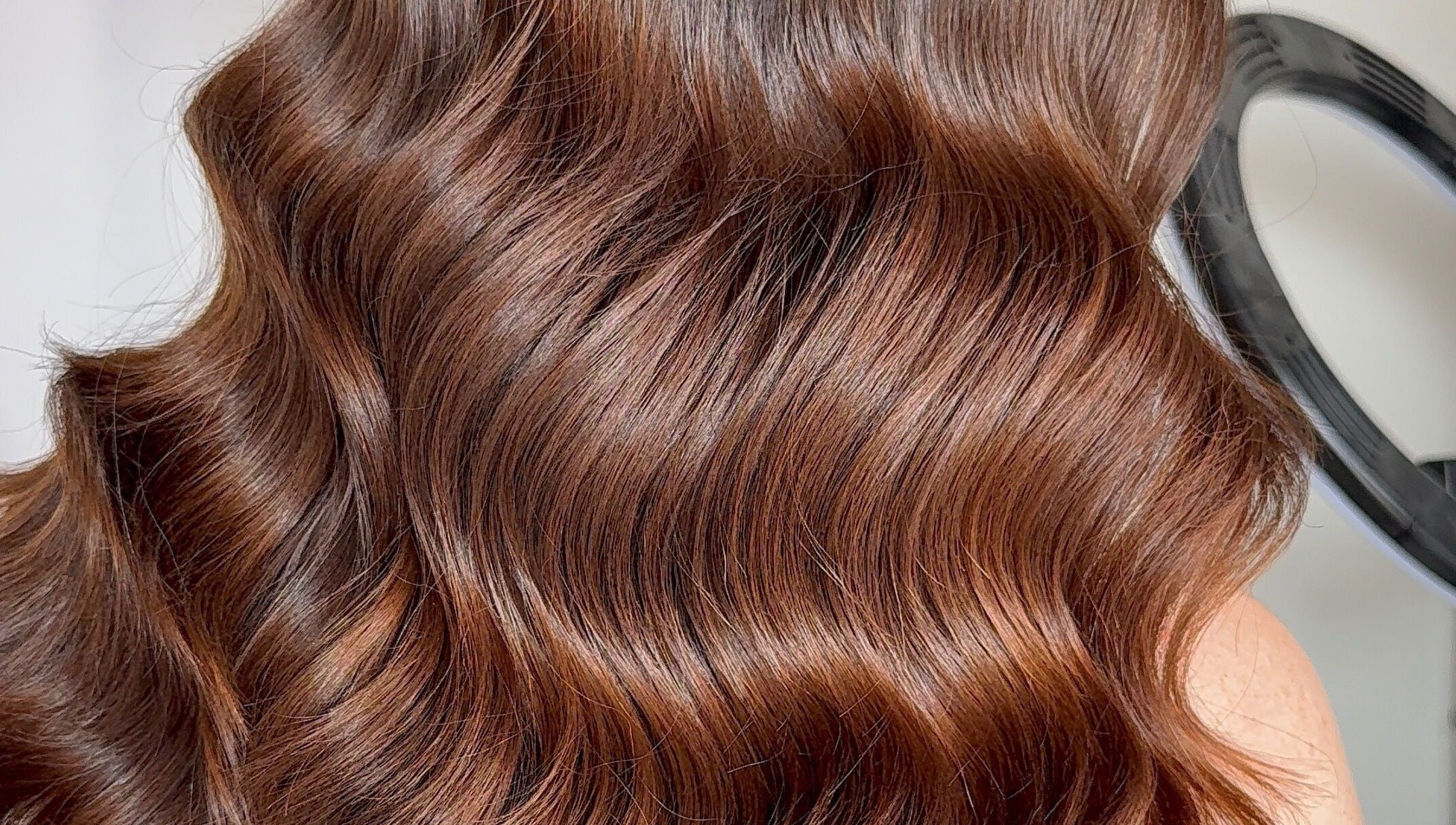 Glossy brown hair waves styled at Hair with K, Rockdale, New South Wales, AU.