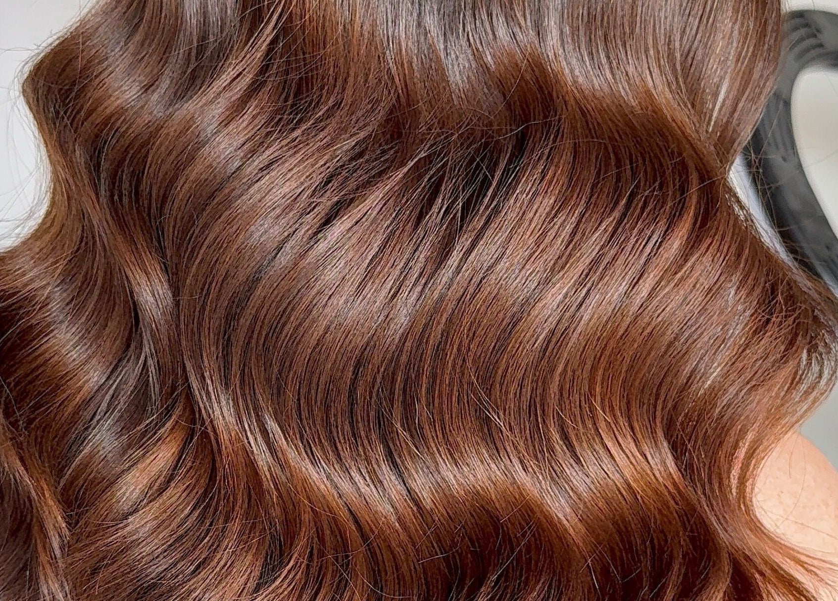 Glossy brown hair waves styled at Hair with K, Rockdale, New South Wales, AU.