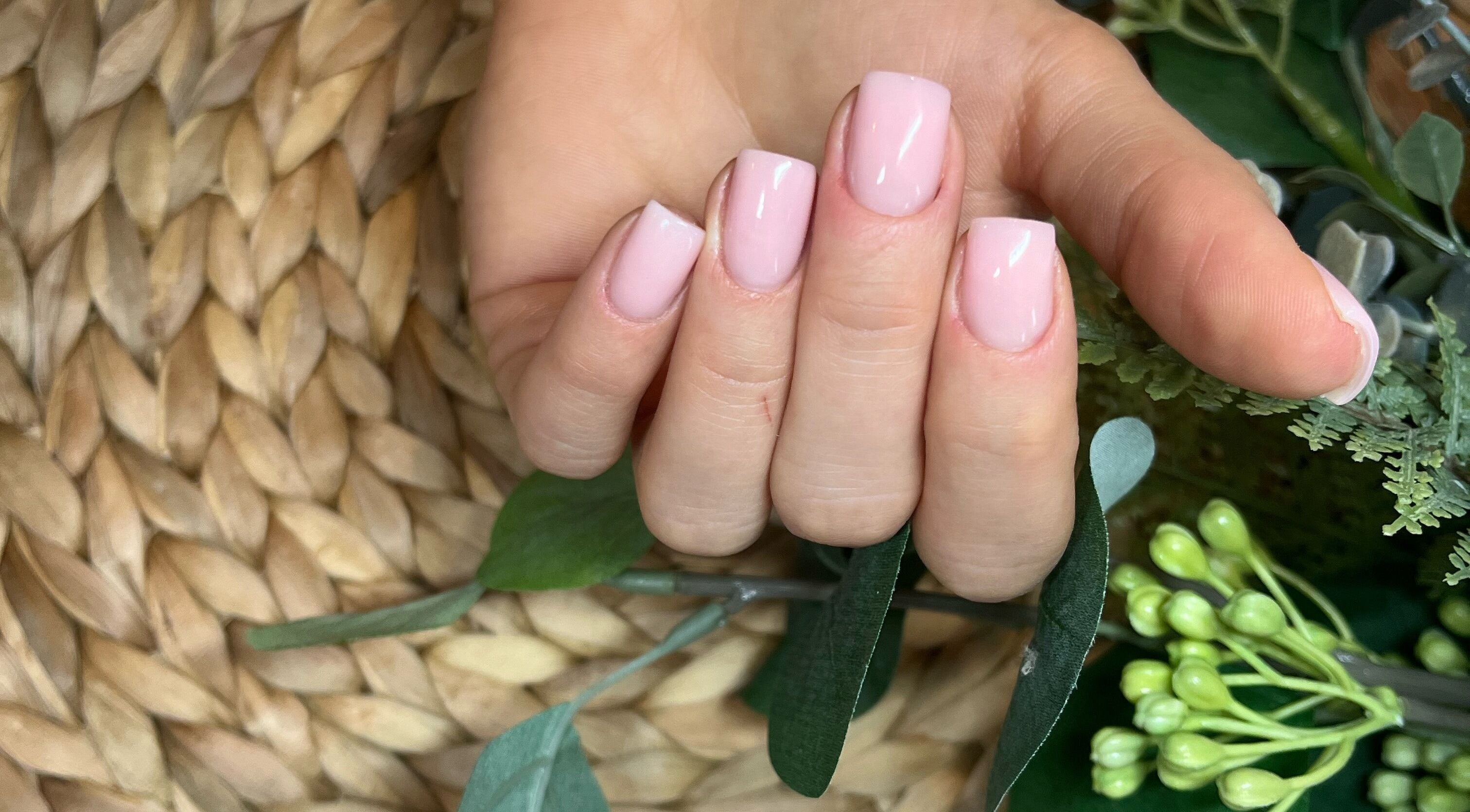 Perfect pink manicure at Classy Nails & Brows in Celbridge, County Kildare, IE. Lush greenery complements the nails.