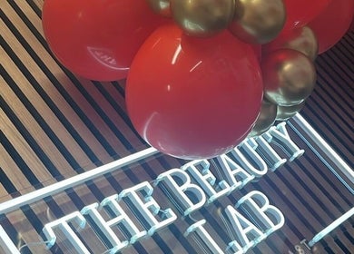 Neon sign and balloons at The Beauty Lab North East South Shields, South Shields, England, GB.